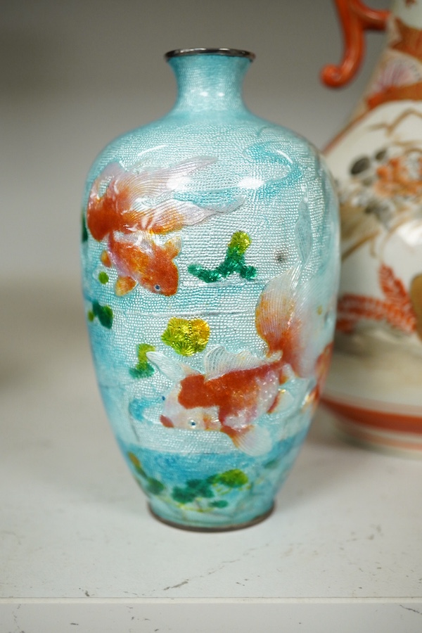 A Japanese kutani vase, 24.5cm high, and a ginbari cloisonné enamel vase decorated with goldfish, 12cm high. Condition - fair.